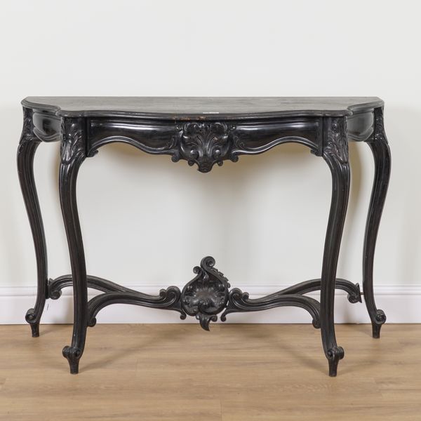 A VICTORIAN STYLE EBSONISED SERPENTINE CONSOLE TABLE