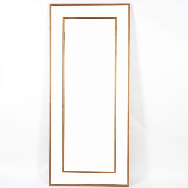 A LARGE MODERN RECTANGULAR WALL MIRROR