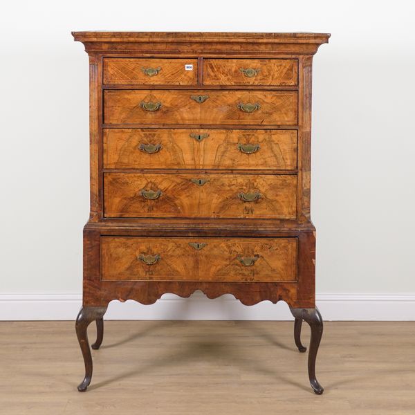 A GEORGE II WALNUT CHEST ON STAND