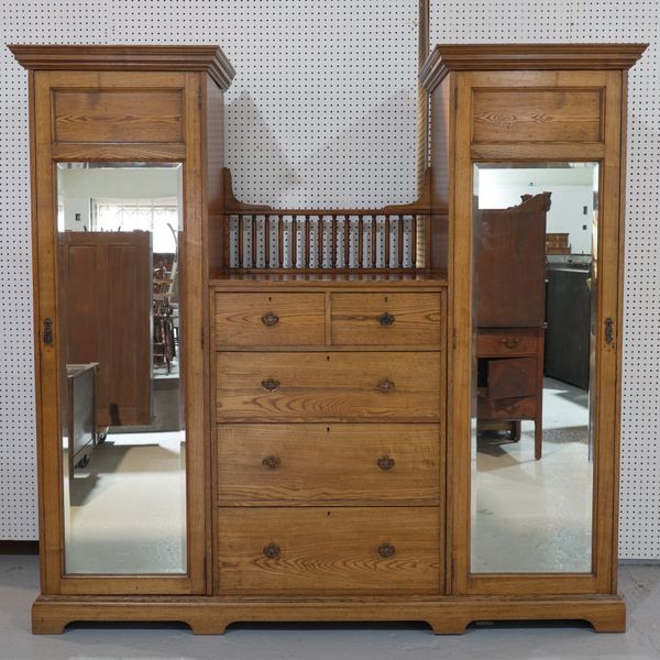 WYLIE AND LOCHHEAD; AN ARTS AND CRAFTS ASH COMPACTOM WARDROBE