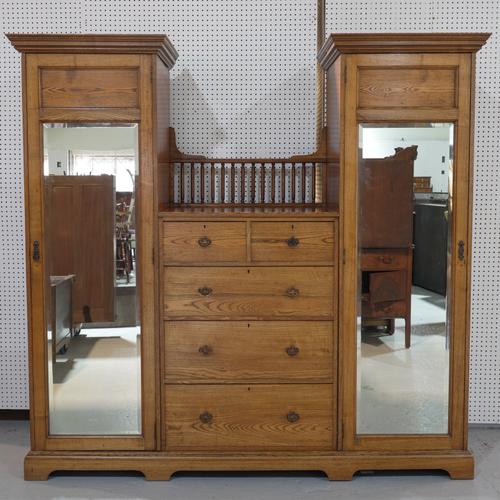 WYLIE AND LOCHHEAD; AN ARTS AND CRAFTS ASH COMPACTOM WARDROBE