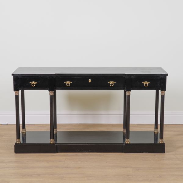 CENTURY FURNITURE INDUSTRIES; AN EMPIRE STYLE GILT METAL MOUNTED EBONISED INVERTED BREAKFRONT THREE DRAWER SIDE TABLE