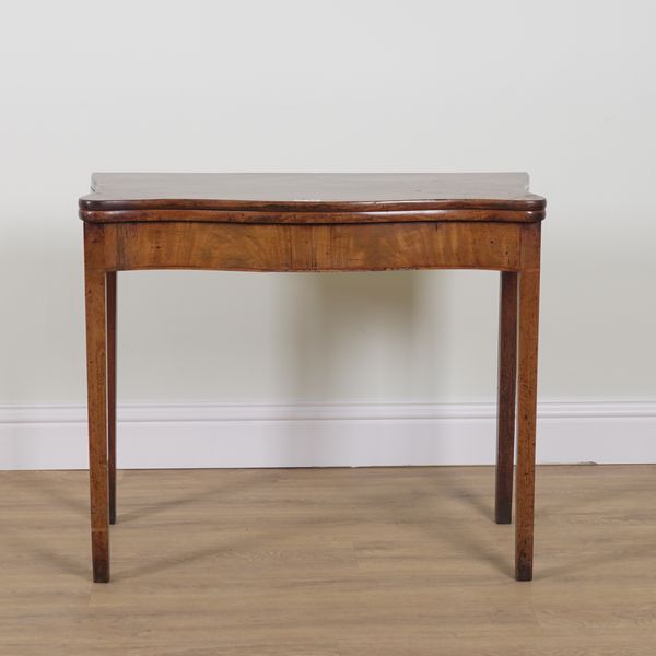 A GEORGE III MAHOGANY SERPENTINE FOLDOVER TEA TABLE