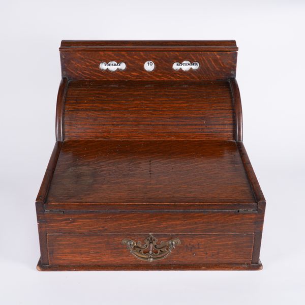 A LATE VICTORIAN OAK ROLL TOP DESK TIDY