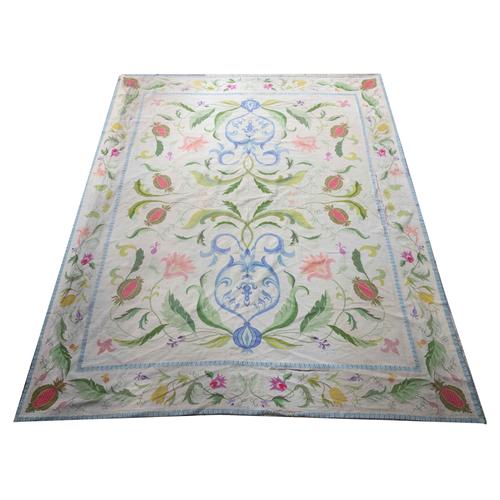 A LARGE PORTUGUESE NEEDLEWORK CARPET AND SEAT RUNNER (2)