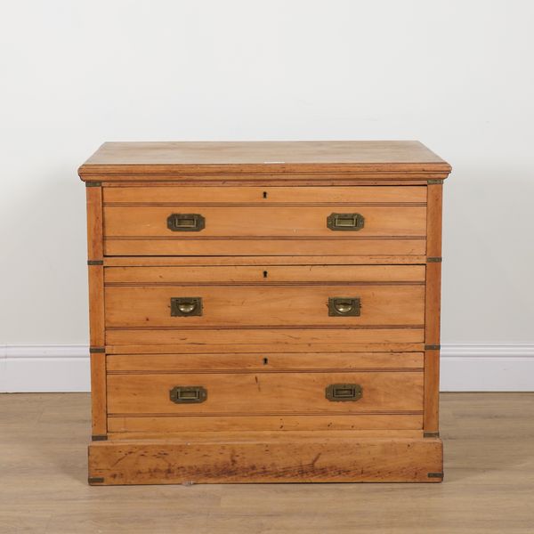 A LATE 19TH CENTURY BRASS BOUND BIRCH CAMPAIGN STYLE CHEST OF DRAWERS
