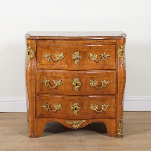 A NORTH EUROPEAN, PROBABLY SWEDISH, GILT METAL MOUNTED WALNUT BOMBE COMMODE