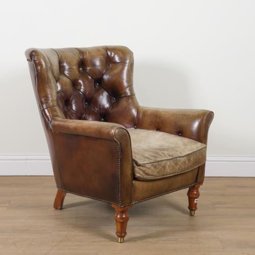 A 20TH CENTURY BRASS STUDDED GREEN LEATHER UPHOLSTERED BUTTON BACK EASY ARMCHAIR