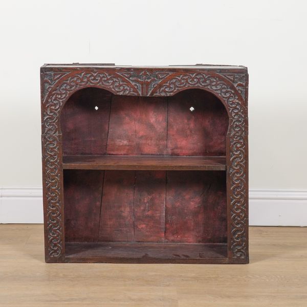 A 17TH CENTURY CARVED OAK TWO TIER WALL SHELF