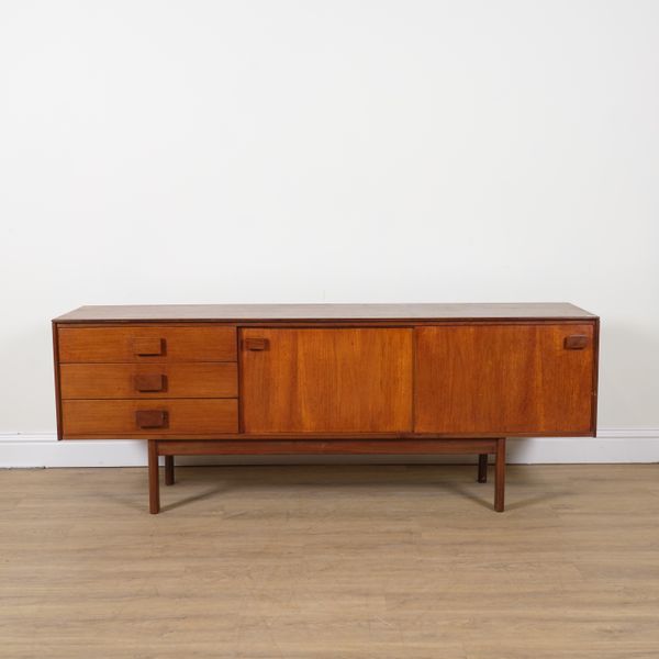 A MID 20TH CENTURY TEAK LOW SIDEBOARD