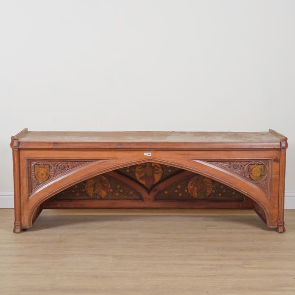 A LARGE ARTS & CRAFTS PITCH PINE ECCLESIASTICAL OVERDOOR/ARCH