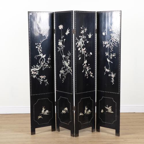 A 20TH CENTURY EASTERN BLACK LACQUER FOUR FOLD SCREEN