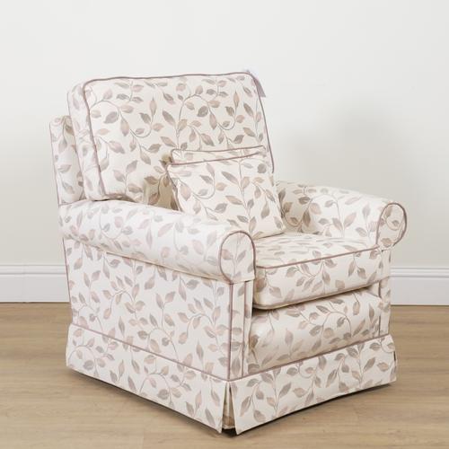 A 20TH CENTURY LEAF UPHOLSTERED EASY ARMCHAIR