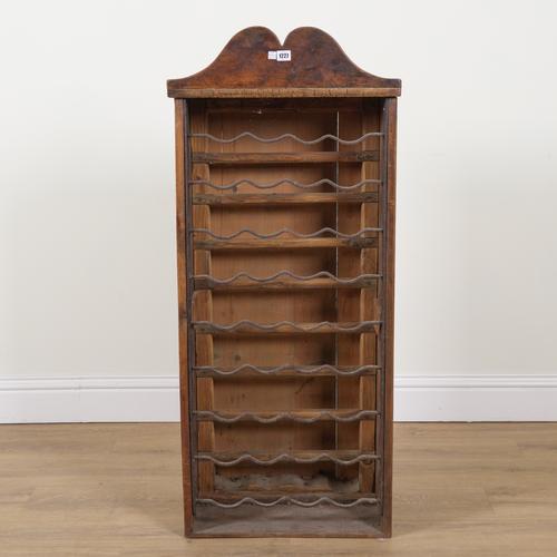 A 20TH CENTURY WAXED PINE AND WROUGHT IRON WINE RACK FOR 36 BOTTLES