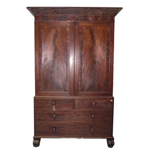AN EARLY VICTORIAN MAHOGANY LINEN PRESS