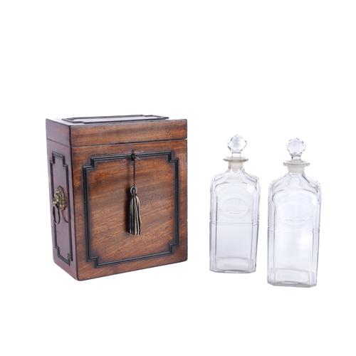 A REGENCY MAHOGANY RECTANGULAR DECANTER BOX AND BOTTLES (3)
