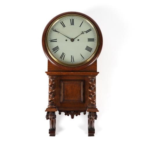 AN OAK CASED DROP DIAL WALL CLOCK