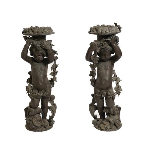 A PAIR OF FRENCH BRONZE PATINATED SPELTER FLOOR STANDING CHERUB JARDINIERES (2)