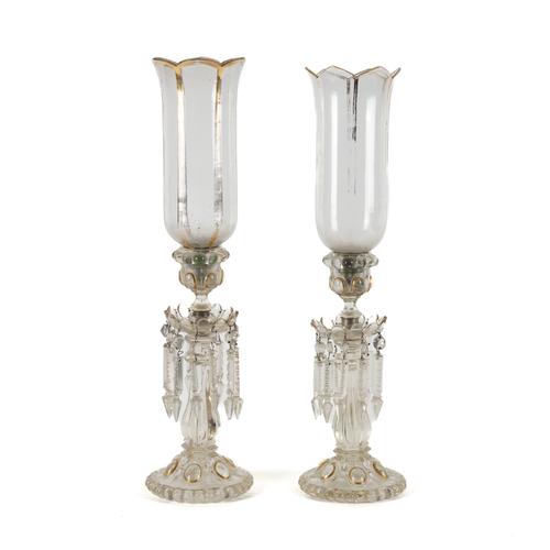 A PAIR OF VICTORIAN GLASS CANDLE HOLDERS WITH STORM SHADES (2)