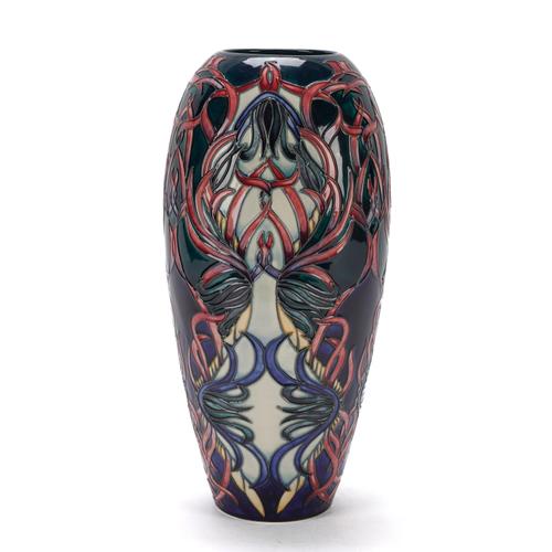 A TALL MOORCROFT LIMITED EDITION `MAYPOLE' PATTERN VASE (2)
