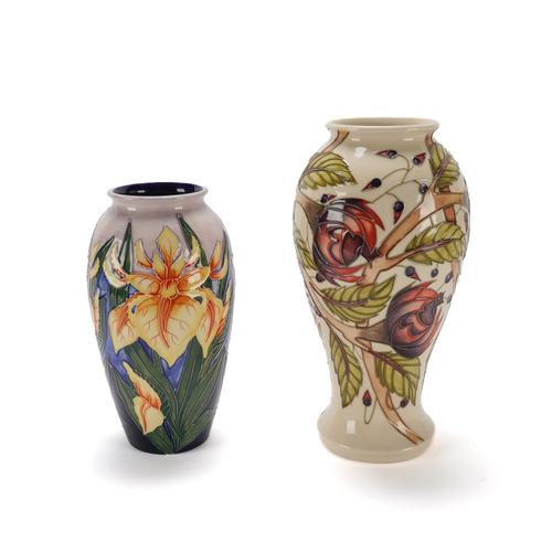 A MOORCROFT 'PIROUETTE BREEZE' PATTERN BALUSTER VASE (2)