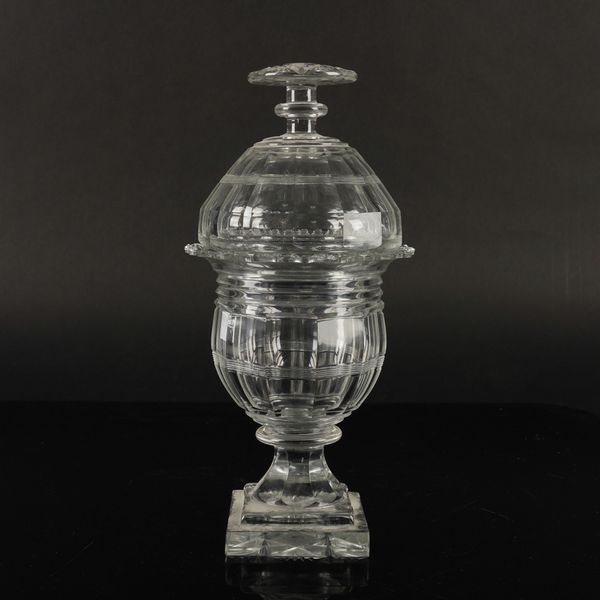 A TALL CUT GLASS SWEETMEAT JAR AND COVER