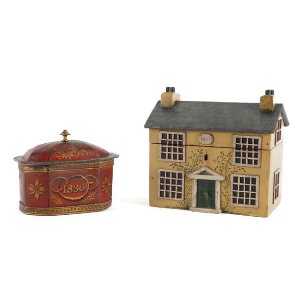 A TEA CADDY IN THE FORM OF A HOUSE AND A LEAD TOBACCO BOX (2)