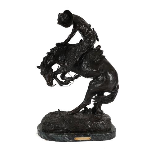 AFTER FREDERICK REMINGTON: A BRONZE GROUP ENTITLED 'RATTLESNAKE'