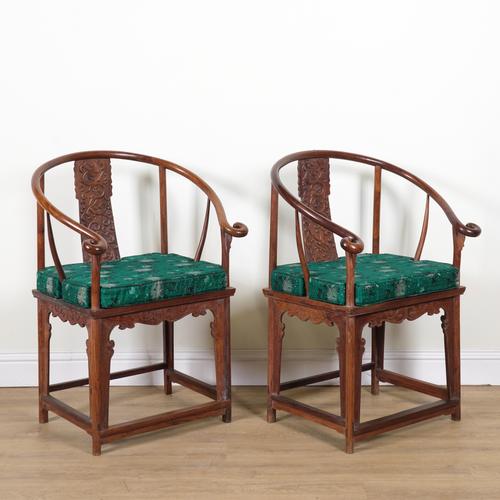 A PAIR OF CHINESE HARDWOOD HORSESHOE-BACK ARMCHAIRS (2)