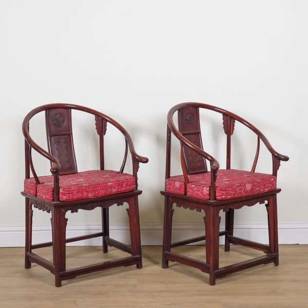 A PAIR OF CHINESE HARDWOOD HORSESHOE-BACK ARMCHAIRS (2)