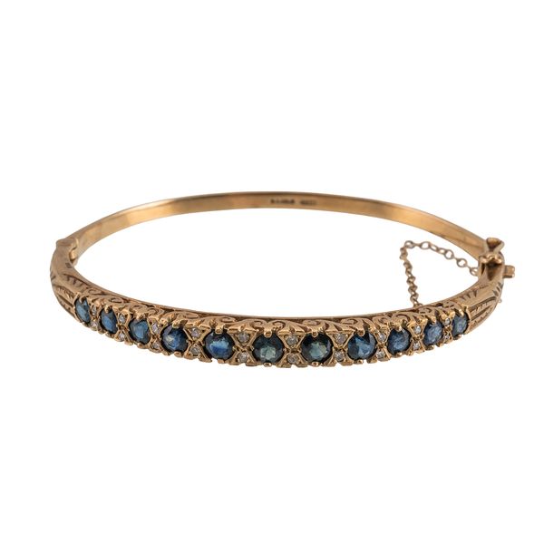 A 9CT GOLD, SAPPHIRE AND DIAMOND OVAL HINGED BANGLE (2)