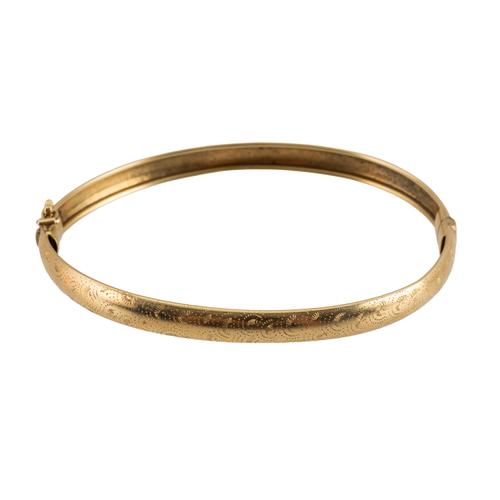 A 14CT GOLD HINGED BANGLE