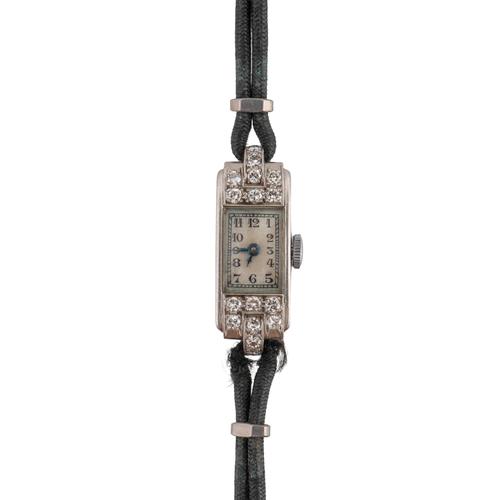 A LADY'S DIAMOND SET DRESS WRISTWATCH