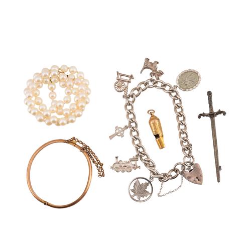 A GOLD PENDANT WHISTLE AND FOUR FURTHER ITEMS (5)