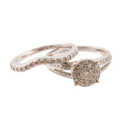 TWO WHITE GOLD AND DIAMOND RINGS (2)