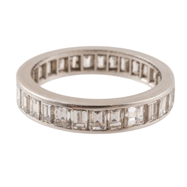 A BAGUETTE CUT DIAMOND ETERNITY RING