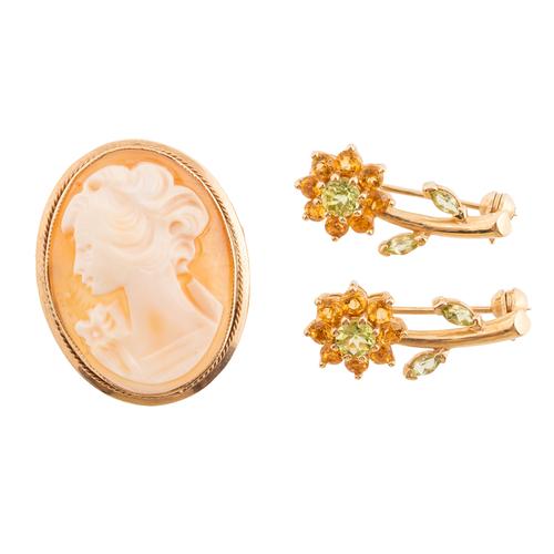 A PAIR OF GOLD AND GEM SET BROOCHES AND A CAMEO BROOCH (3)