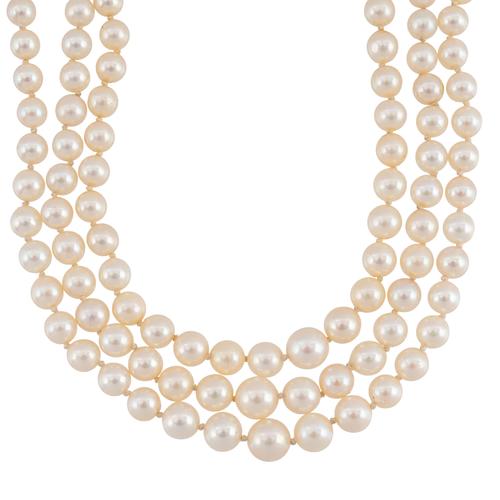 A THREE STRAND PEARL NECKLACE
