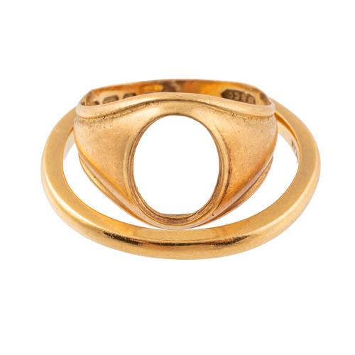 A BAND RING AND A SIGNET RING MISSING ITS SEAL (2)