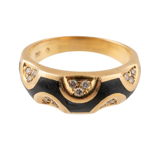 A DIAMOND SET AND BLACK ENAMELLED RING