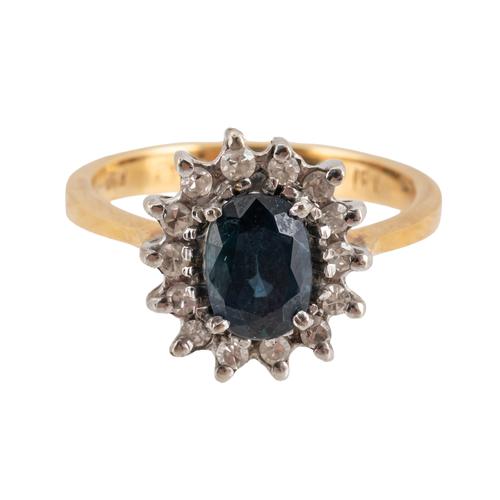 AN 18CT GOLD, SAPPHIRE AND DIAMOND OVAL CLUSTER RING