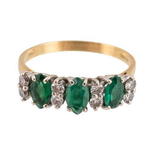 AN EMERALD AND DIAMOND RING