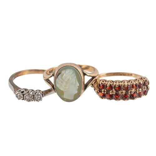 A 9CT GOLD AND GARNET RING AND TWO FURTHER GOLD RINGS (3)