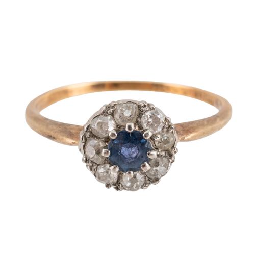 A SAPPHIRE AND DIAMOND RING
