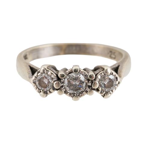 A 9CT GOLD AND DIAMOND THREE STONE RING