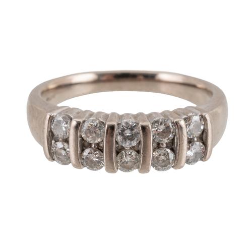 AN 18CT WHITE GOLD AND DIAMOND TEN STONE RING