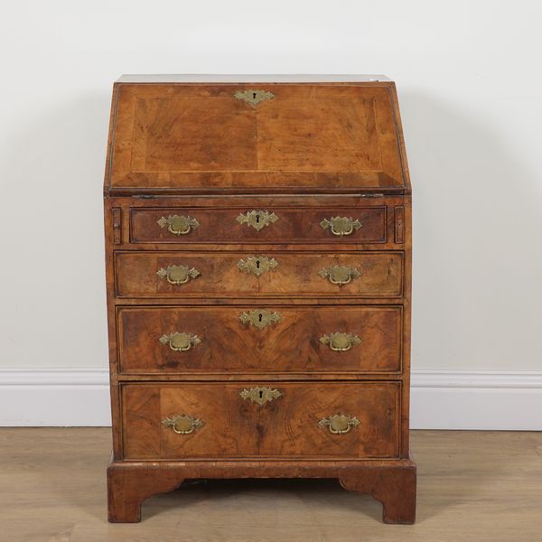 A MID 18TH CENTURY FEATHER BANDED WALNUT BUREAU