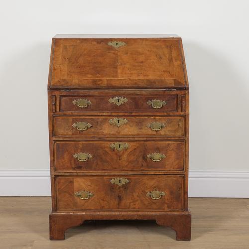 A MID 18TH CENTURY FEATHER BANDED WALNUT BUREAU