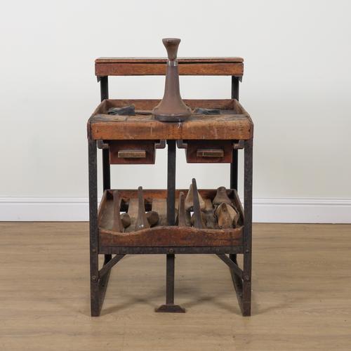 A COBBLER'S OAK AND METAL THREE TIER WORK BENCH