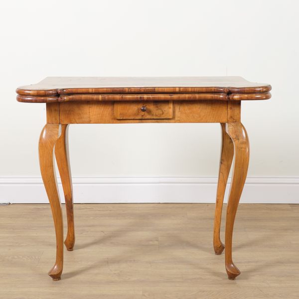 A MID 18TH CENTURY NORTH EUROPEAN WALNUT FOLDOVER CARD TABLE
